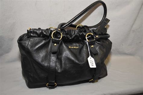 miu miu vintage bag|second hand miu mius.